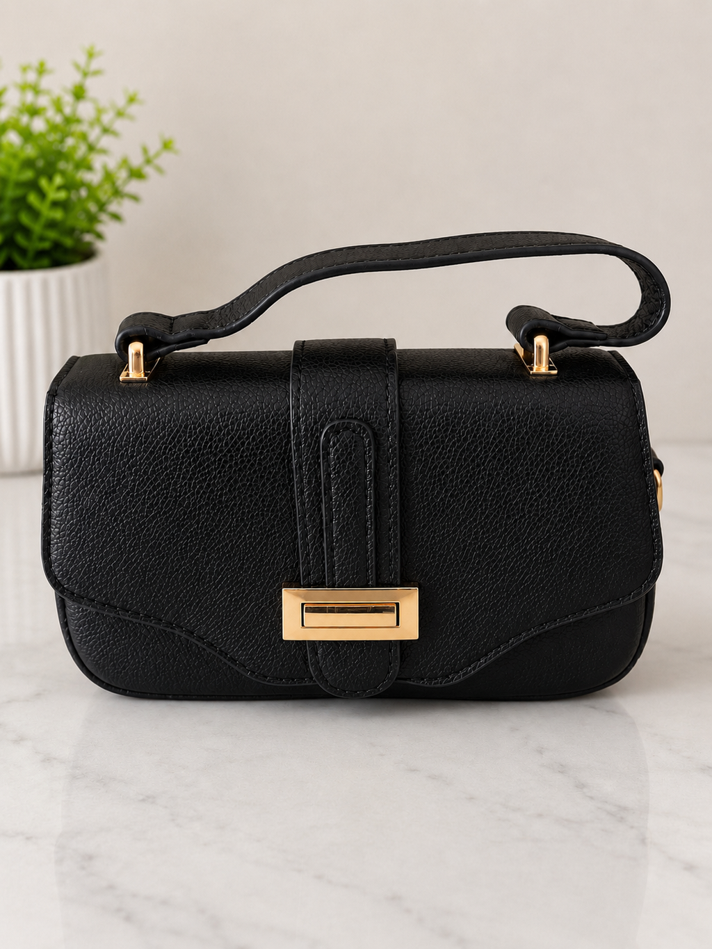 Elegant Black Top Handle Crossbody Handbag with Gold Clasp
