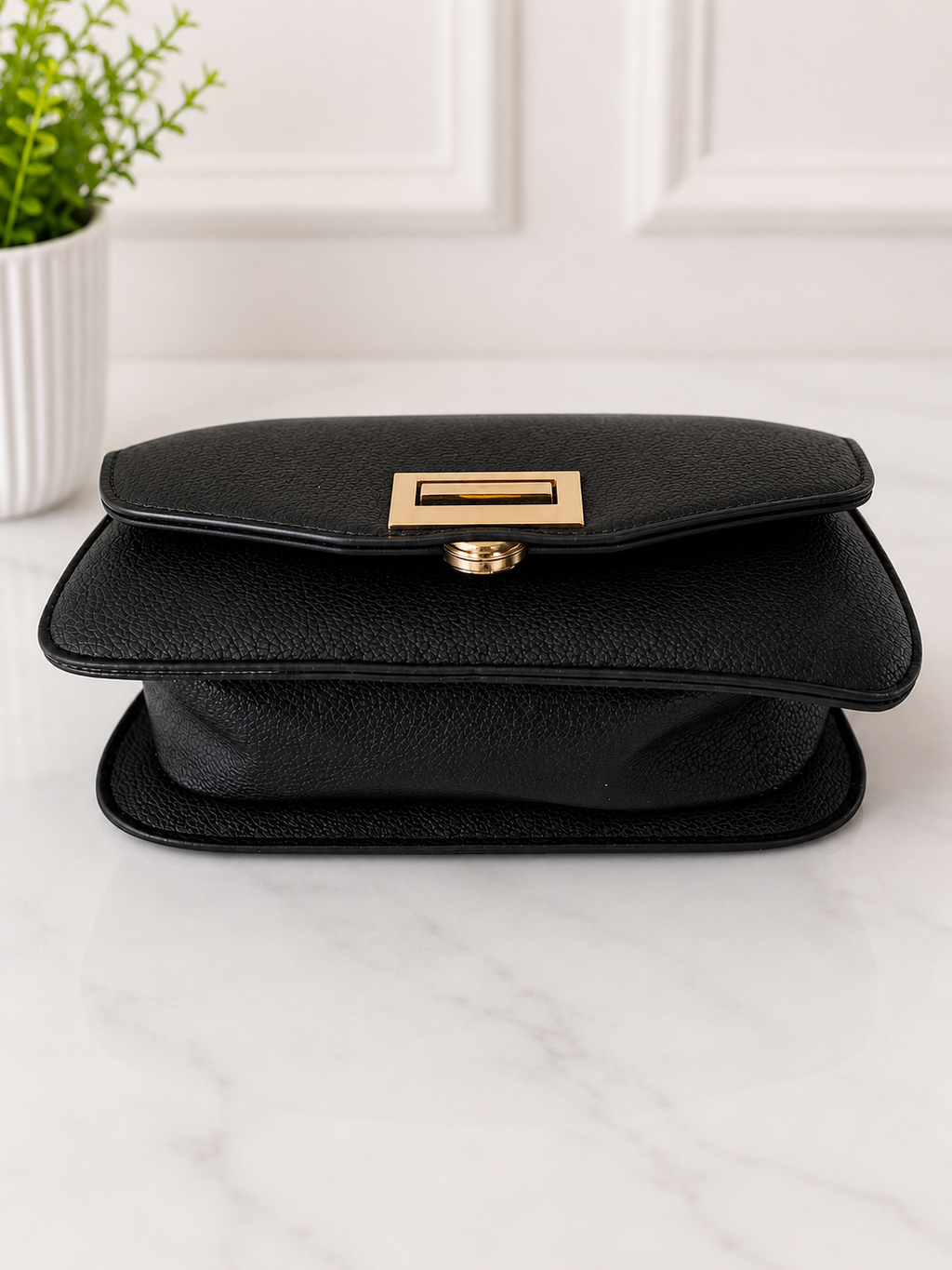Elegant Black Top Handle Crossbody Handbag with Gold Clasp
