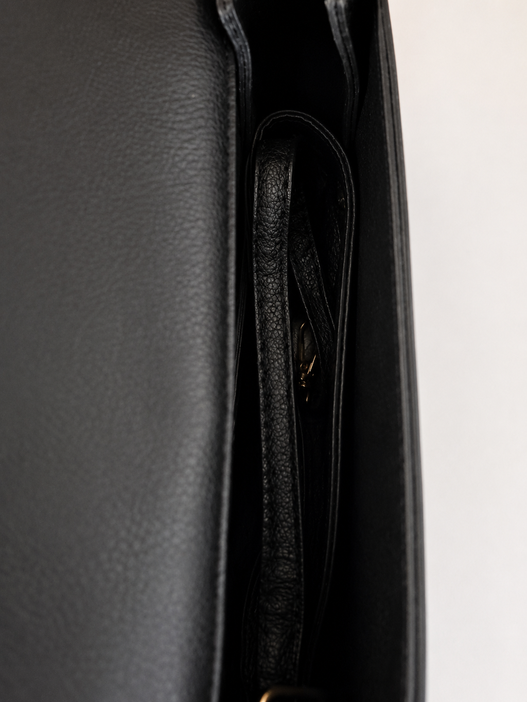 Elegant Black Top Handle Crossbody Handbag with Gold Clasp