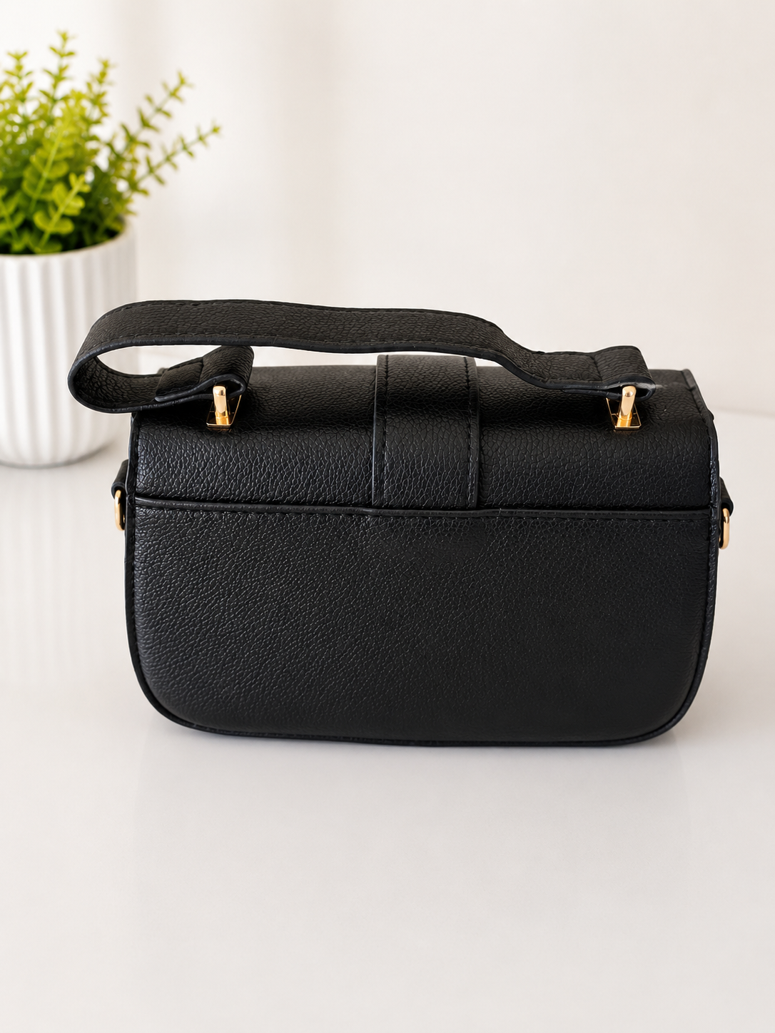 Elegant Black Top Handle Crossbody Handbag with Gold Clasp