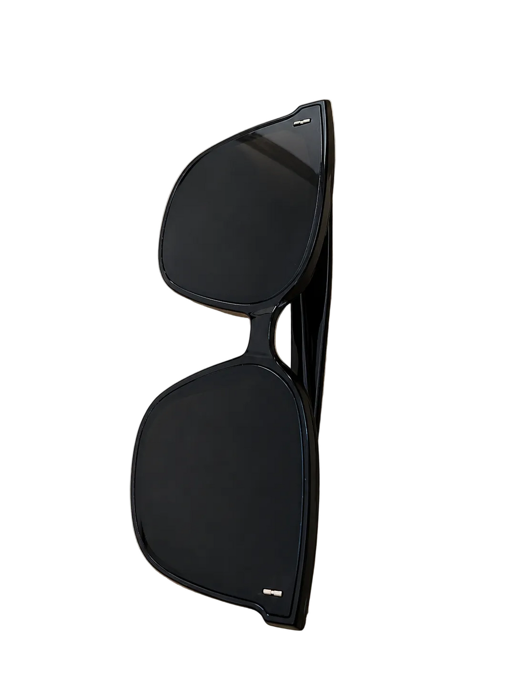    Women’s oversized black square sunglasses with black UV lenses.”